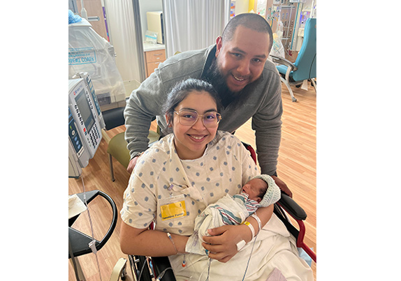 Tiffany Borrego holds her newborn son John Ezekiel Mendez, Jr.