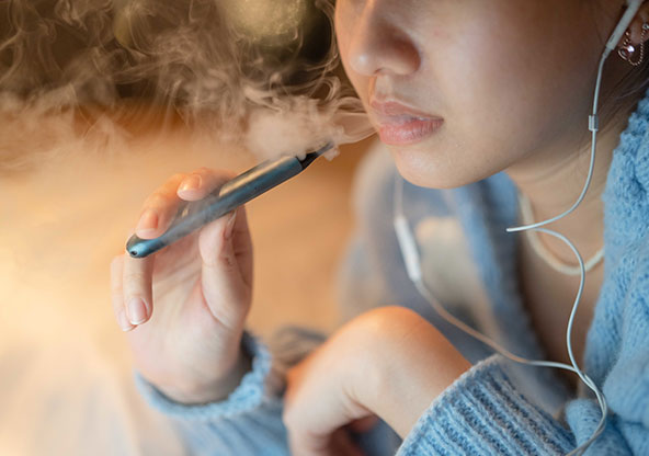 Teen girl vaping