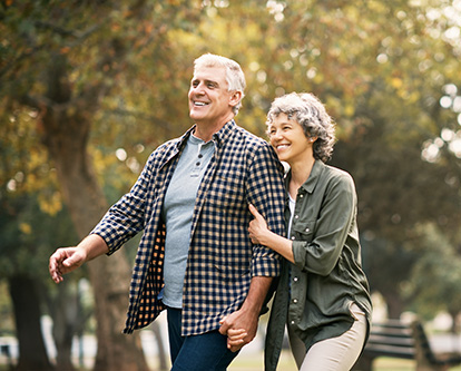 Shot of a happy senior couple going for a walk in the park