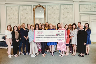 Women's Board Check Presentation