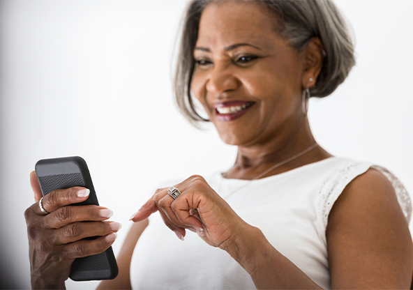 An elder black lady taking a peripheral arterial disease risk assessment 